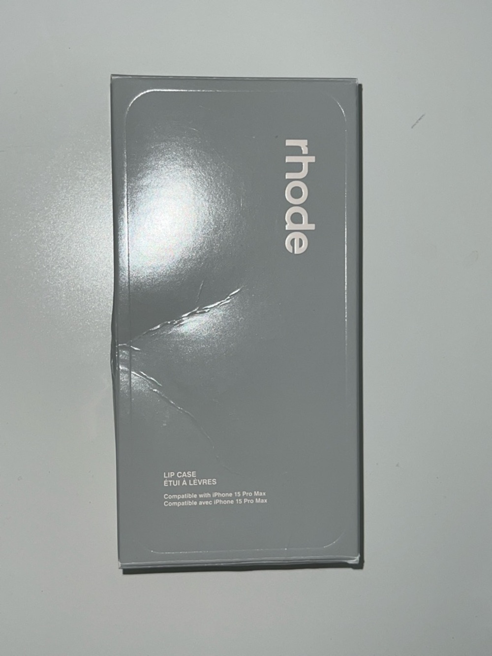 RHODE Lip Case in Light Gray with Pale Pink Logo